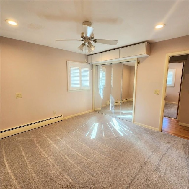919 W Broad St, Horseheads, NY 14845 - unfurnished bedroom featuring recessed lighting, baseboards, light colored carpet, and a baseboard radiator