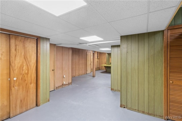 67 Nottingham Ter, Buffalo, NY 14216 - finished below grade area featuring a paneled ceiling and wood walls