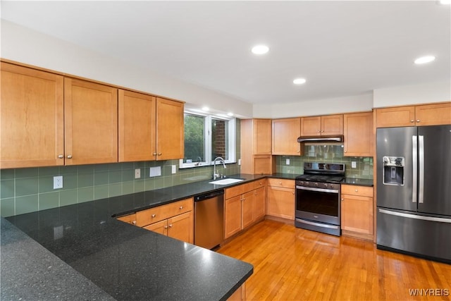67 Nottingham Ter, Buffalo, NY 14216 - kitchen with stainless steel appliances, a sink, backsplash, recessed lighting, and light wood-style floors