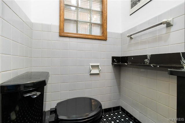 67 Nottingham Ter, Buffalo, NY 14216 - bathroom with tile walls and toilet