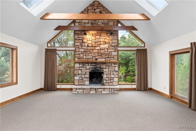 67 Nottingham Ter, Buffalo, NY 14216 - unfurnished living room featuring a skylight, high vaulted ceiling, a fireplace, and carpet