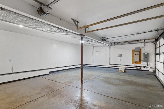 67 Nottingham Ter, Buffalo, NY 14216 - garage featuring electric panel and a garage door opener