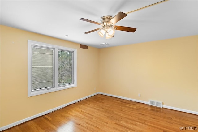 67 Nottingham Ter, Buffalo, NY 14216 - unfurnished room with baseboards, light wood-type flooring, and ceiling fan