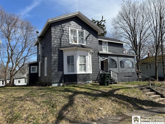 48 Thayer St, Jamestown, NY 14701 - view of front of home featuring a front yard