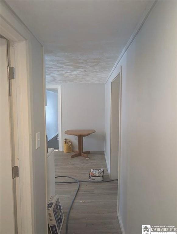 48 Thayer St, Jamestown, NY 14701 - corridor with baseboards and wood finished floors