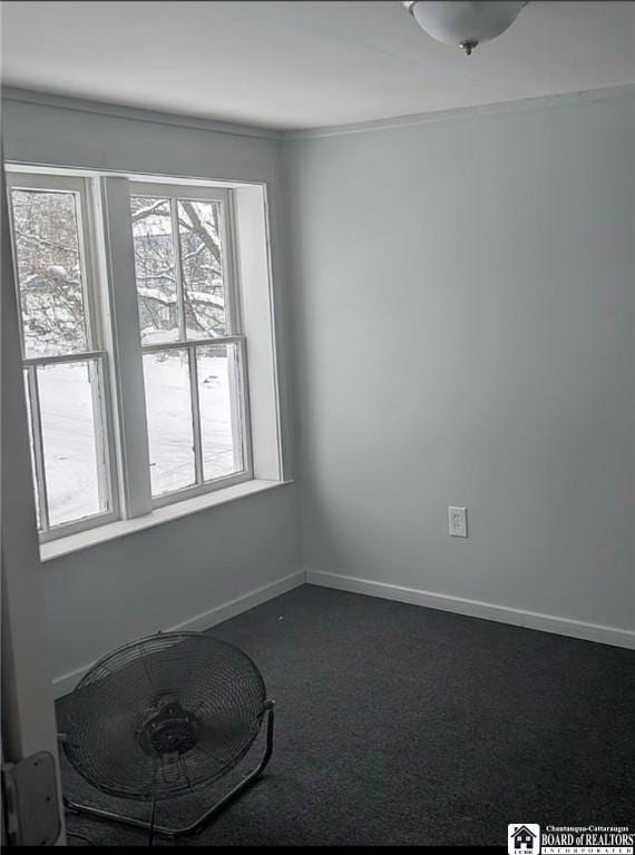 48 Thayer St, Jamestown, NY 14701 - empty room with dark colored carpet and baseboards