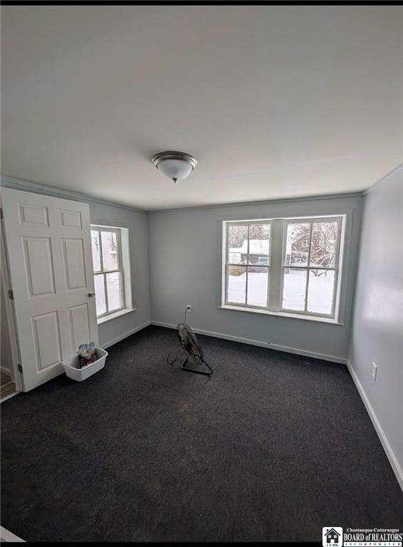 48 Thayer St, Jamestown, NY 14701 - unfurnished room with baseboards and dark colored carpet
