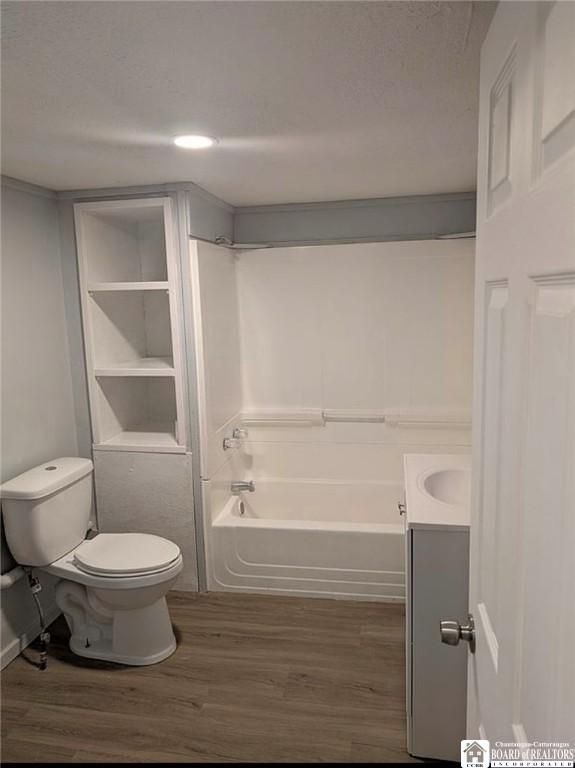 48 Thayer St, Jamestown, NY 14701 - bathroom with toilet, wood finished floors, and a textured ceiling