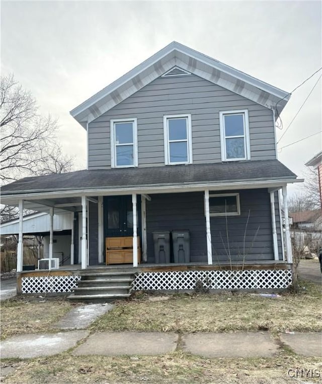 221 Turin St, Rome-Inside, NY 13440 - view of front facade with a porch