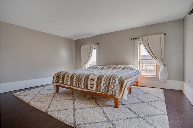 bedroom featuring wood finished floors