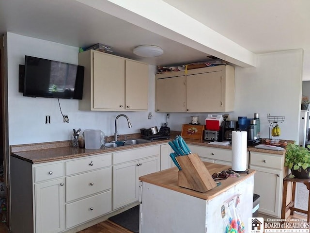 6098 Shady Ln, Lyndon, NY 14737 - kitchen with white cabinetry and a center island
