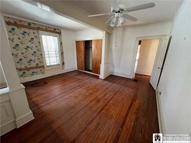 213 S Clinton St, Olean-City, NY 14760 - unfurnished bedroom with a closet, dark wood-type flooring, baseboards, and ornamental molding