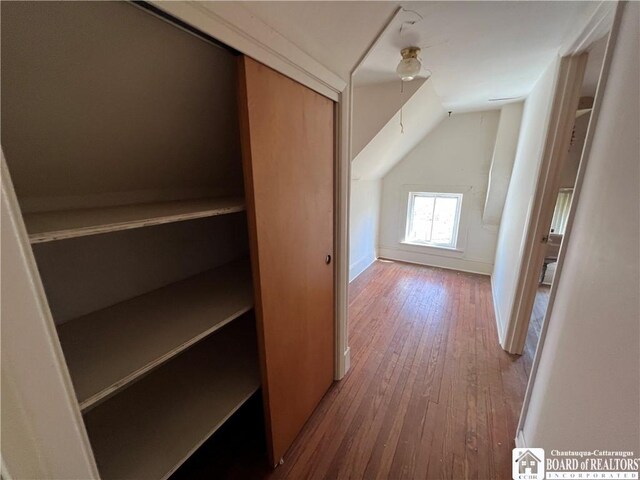 213 S Clinton St, Olean-City, NY 14760 - hall featuring wood-type flooring and vaulted ceiling