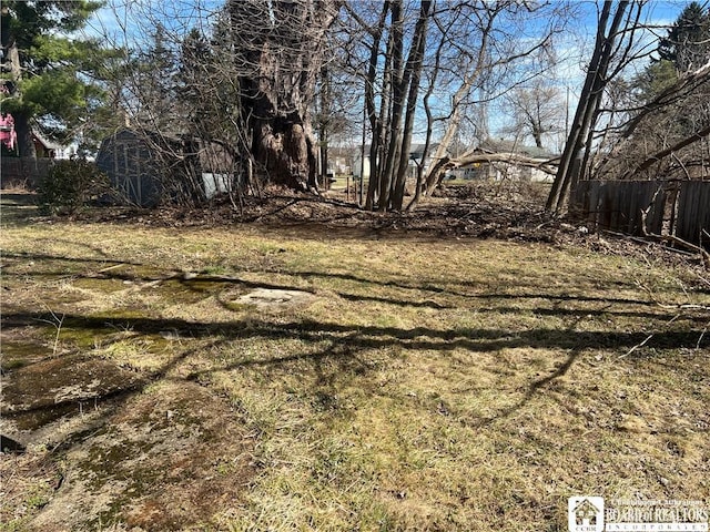 213 S Clinton St, Olean-City, NY 14760 - view of yard with an outbuilding, a storage shed, and fence