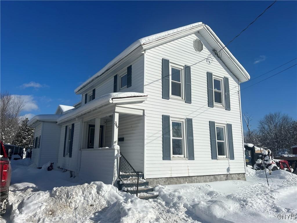 view of snow covered property