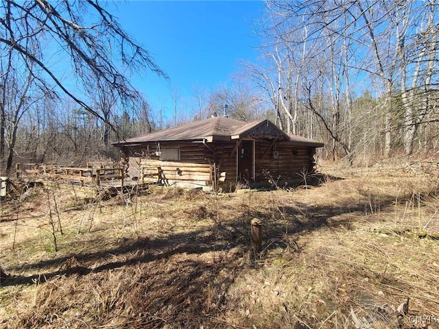 6310 Vosburgh Rd, Lebanon, NY 13332 - view of side of property with log siding