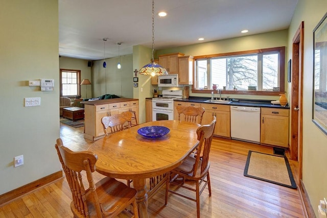 dining room with baseboards, visible vents, recessed lighting, and light wood-type flooring