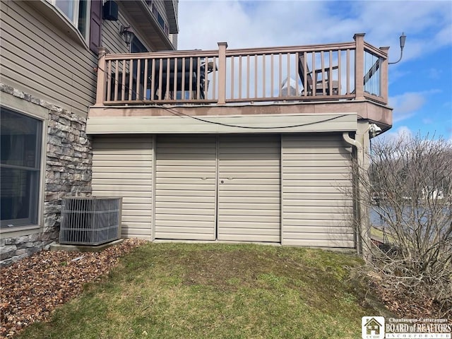 exterior space featuring central AC unit