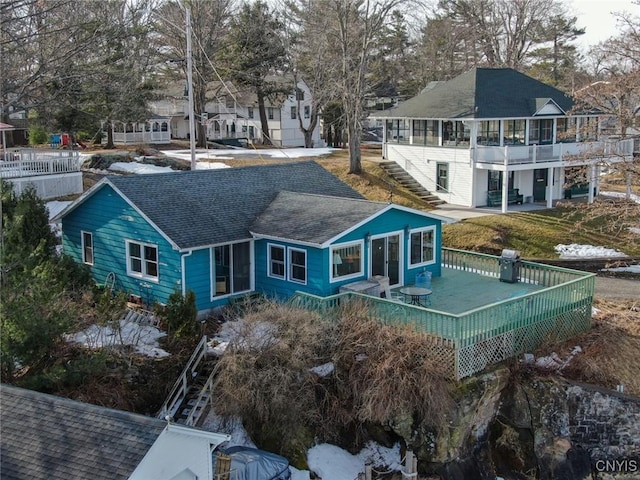 21093 Cliff Ave, Alexandria, NY 13607 - rear view of house with a wooden deck, a residential view, roof with shingles, and stairs