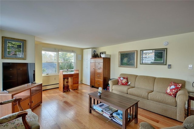 21093 Cliff Ave, Alexandria, NY 13607 - living room featuring light wood-style floors and a baseboard radiator