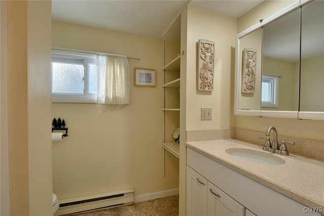 21093 Cliff Ave, Alexandria, NY 13607 - bathroom with vanity, a wealth of natural light, toilet, and baseboard heating