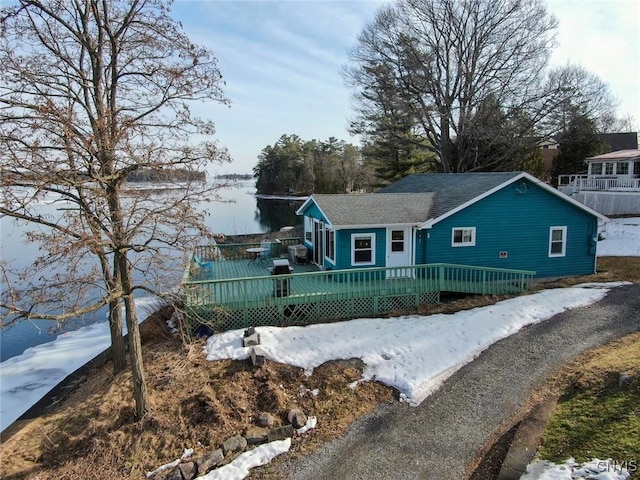 21093 Cliff Ave, Alexandria, NY 13607 - view of front of home featuring a wooden deck and a shingled roof
