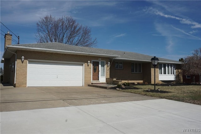 480 Lakeview Ave, Orchard Park, NY 14127 - ranch-style home featuring concrete driveway, brick siding, and an attached garage