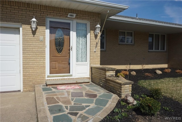480 Lakeview Ave, Orchard Park, NY 14127 - entrance to property featuring brick siding and an attached garage
