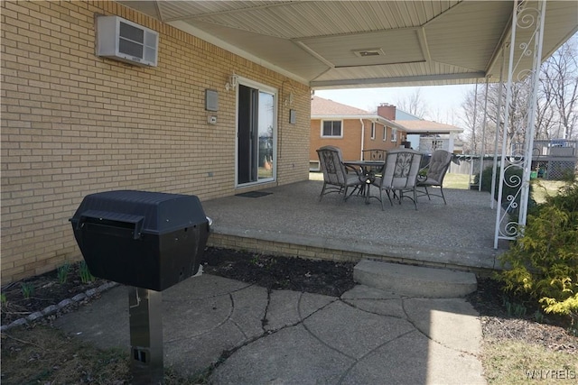 480 Lakeview Ave, Orchard Park, NY 14127 - view of patio / terrace featuring outdoor dining area and a wall unit AC