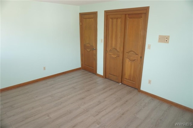 480 Lakeview Ave, Orchard Park, NY 14127 - unfurnished bedroom with light wood-type flooring and baseboards