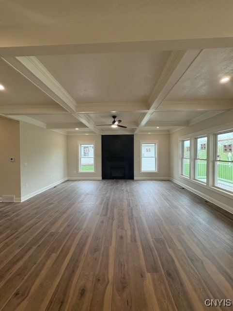 3515 Tall Tree Ln, Lysander, NY 13027 - unfurnished living room featuring coffered ceiling, dark wood-style flooring, beamed ceiling, and baseboards