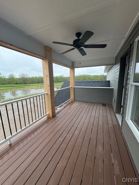3515 Tall Tree Ln, Lysander, NY 13027 - deck with ceiling fan and a water view