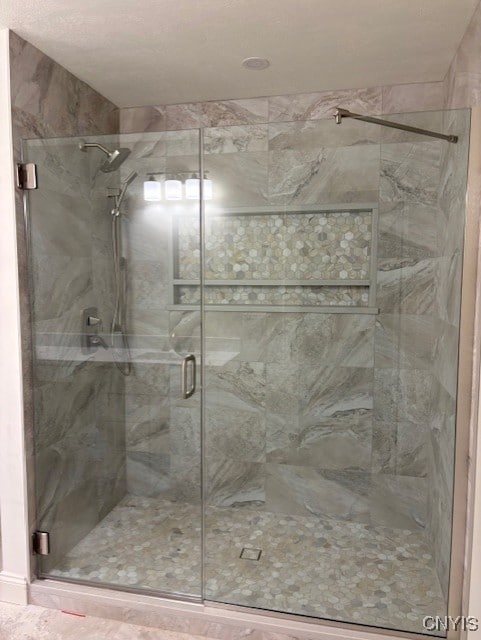 3515 Tall Tree Ln, Lysander, NY 13027 - bathroom featuring a stall shower