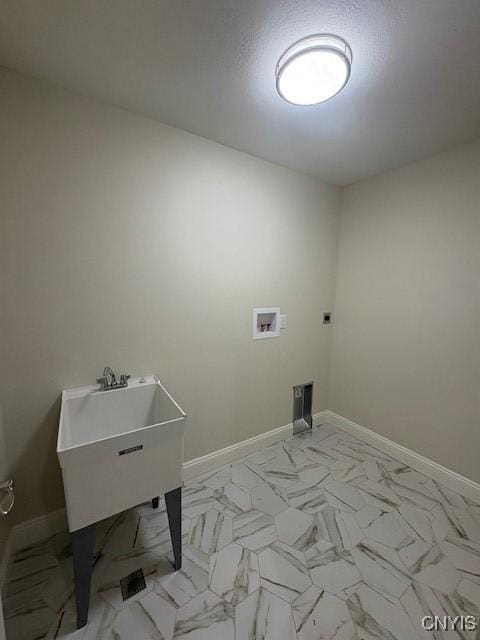 3515 Tall Tree Ln, Lysander, NY 13027 - clothes washing area featuring a sink, laundry area, washer hookup, baseboards, and marble finish floor