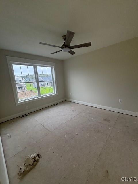 3515 Tall Tree Ln, Lysander, NY 13027 - empty room with baseboards, visible vents, and a ceiling fan