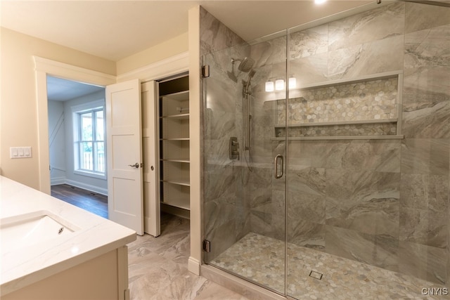 3515 Tall Tree Ln, Lysander, NY 13027 - full bath featuring vanity, a shower stall, and marble finish flooring