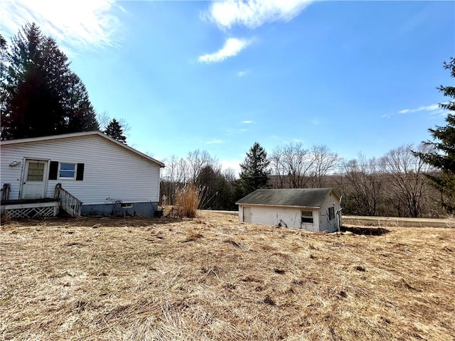 166 Backus Rd, New Lisbon, NY 13342 - view of home's exterior featuring an outbuilding