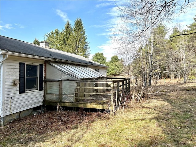 166 Backus Rd, New Lisbon, NY 13342 - view of side of home featuring a chimney