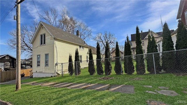 view of yard with a fenced backyard