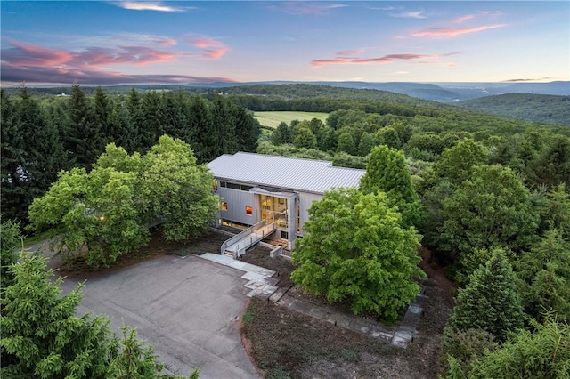 10289-10288 Whispering Wind Trl, Corning, NY 14830 - aerial view at dusk of a forest view