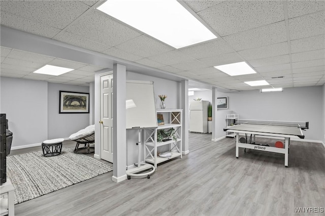 4369 Autumn Ln, Lewiston, NY 14092 - rec room with a drop ceiling, baseboards, and wood finished floors