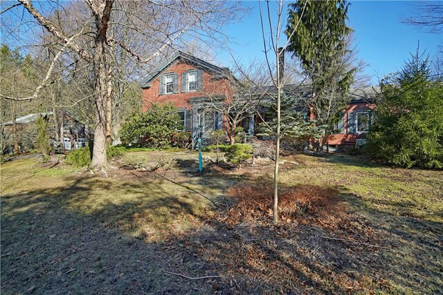 view of front of home with a front yard