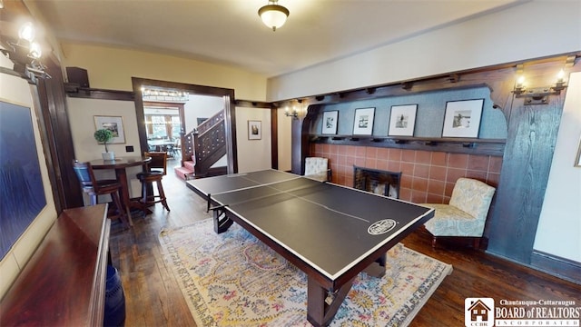 recreation room with wood finished floors