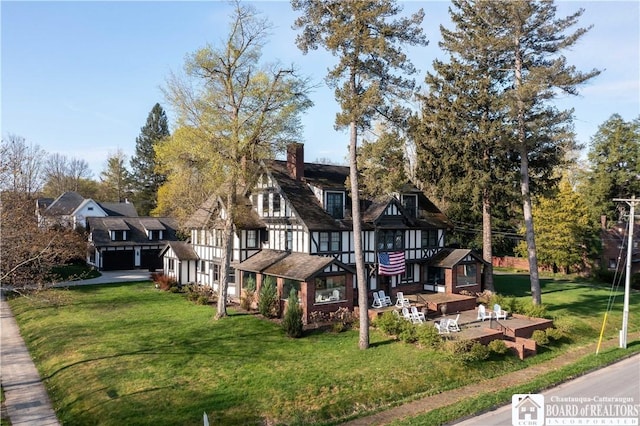 back of property with a yard