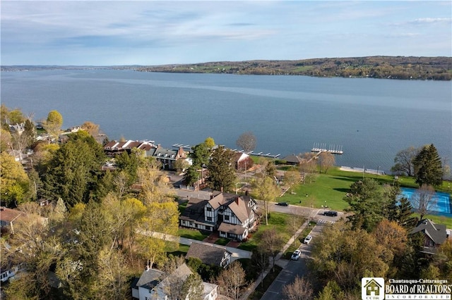 aerial view with a water view and a residential view