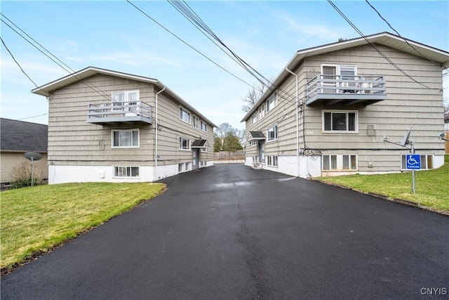 exterior space with aphalt driveway