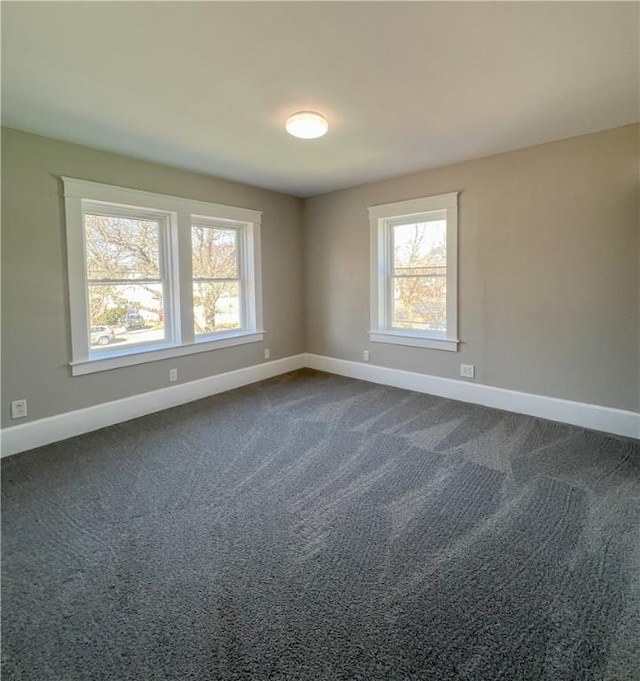 1230 Lake St, Elmira-City, NY 14901 - unfurnished room featuring baseboards and dark colored carpet