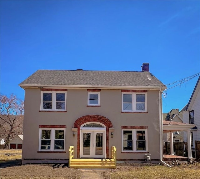 1230 Lake St, Elmira-City, NY 14901 - rear view of property with french doors, a chimney, stucco siding, and a shingled roof