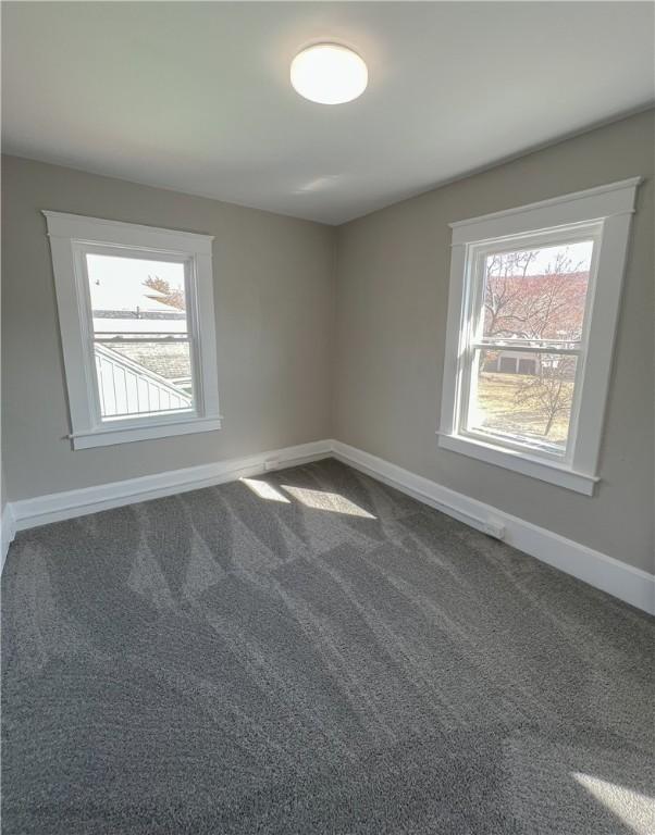 1230 Lake St, Elmira-City, NY 14901 - carpeted spare room with baseboards