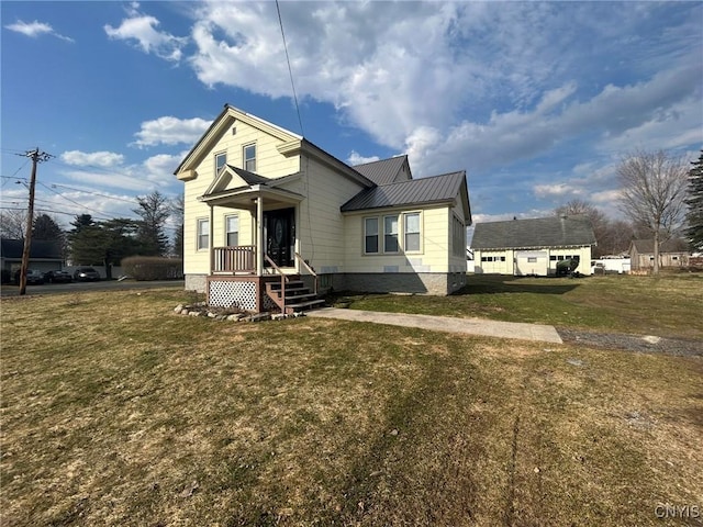 140 Riverside Dr, Utica, NY 13502 - view of front of home with a front lawn and metal roof